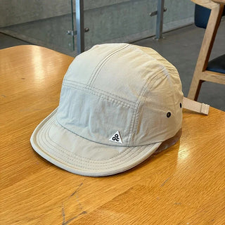 Casquette plate imperméable